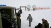 Russian soldiers stand at a radar facility on the Alexandra Land island near Nagurskoye, Russia, May 17, 2021. The facility is Russia's northernmost military outpost. 