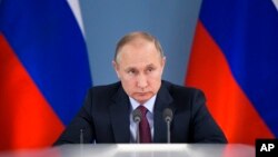 Russian President Vladimir Putin attends a meeting during his visit to Samara, Russia, March 7, 2018. Putin had more words of praise for U.S. President Donald Trump in a documentary released March 7 but expressed disappointment with the U.S. political sys