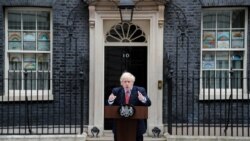 Britain's Johnson returns to work