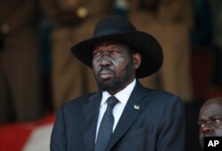 FILE - South Sudan's President Salva Kiir attends the state funeral of Kenya's former president Daniel arap Moi, at Nyayo Stadium in the capital Nairobi, Kenya, Feb. 11, 2020.