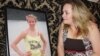 Liesl Gottert looks at a photo of her daughter, Klara, who recently took her own life in Johannesburg. (D. Taylor/VOA)