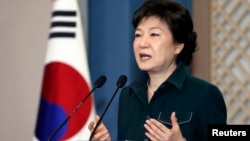 South Korea's President Park Geun-hye speaks to the nation at the presidential Blue House in Seoul, March 4, 2013 file photo. 