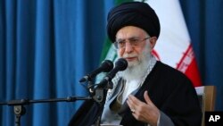 FILE - In this picture released by an official website of the office of the Iranian supreme leader on Sunday, March 20, 2016, Ayatollah Ali Khamenei speaks to a crowd in the northern city of Mashhad, Iran.