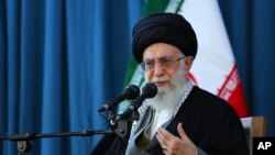 In this picture released by an official website of the office of the Iranian supreme leader on Sunday, March 20, 2016, Supreme Leader Ayatollah Ali Khamenei speaks to a crowd in the northern city of Mashhad, Iran.