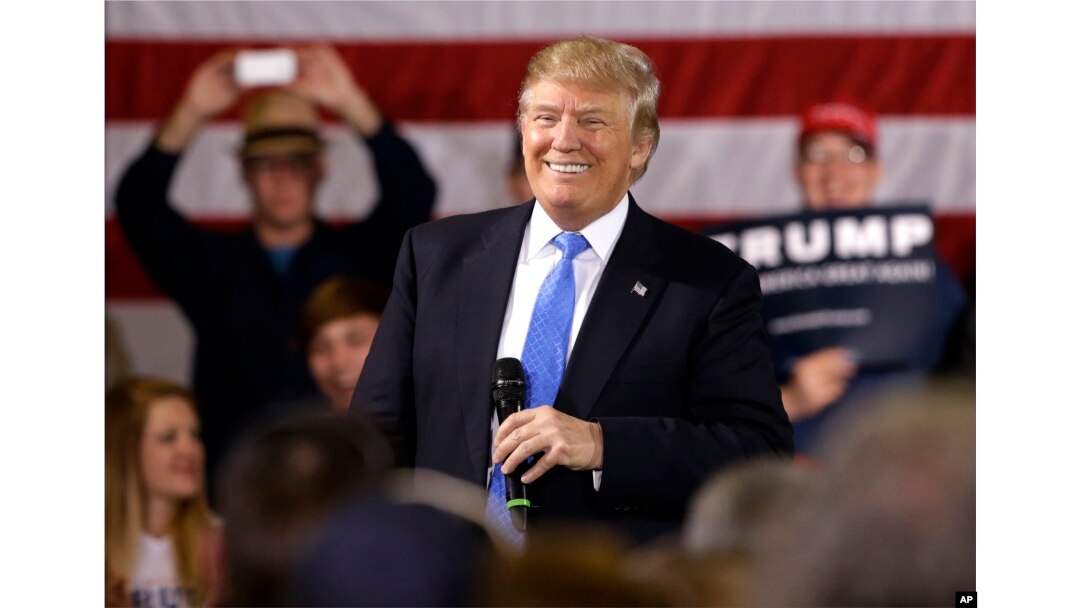 Republican presidential candidate Donald Trump smiles as he speaks at a campaign stop Tuesday, March 29, 2016.