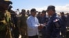 Leslie Voltaire, president of Haiti's transition council, welcomes a military contingent from El Salvador, at the Toussaint Louverture International Airport, in Port-au-Prince, Haiti, Feb. 4, 2025. 