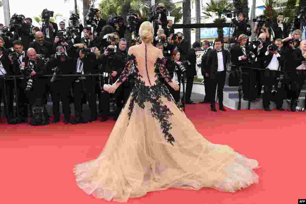 Israeli socialite and TV host Hofit Golan poses as she arrives for the opening ceremony of the 68th Cannes Film Festival in Cannes, southeastern France.