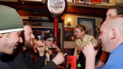 University students drinking beer at a pub in Cambridge, Massachusetts