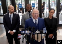 Steve Greenberg, R. Kelly's defense attorney, smiles as he responds to a question after Kelly pleaded not guilty on 11 new sex-related felonies in Chicago, June 6, 2019.