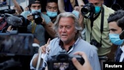 FILE - Former White House chief strategist Steve Bannon exits the Manhattan Federal Court in New York City, Aug. 20, 2020. 