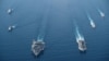 美國海軍羅斯福號航母戰鬥群與馬金島號兩棲戒備群2021年4月9日在南中國海進行編組巡航。（美國海軍照片）