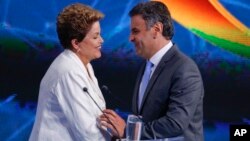 Dilma Rousseff y Aecio Neves se enfrentarán en la segunda vuelta el 26 de octubre.