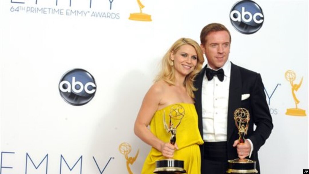 Claire Danes dan Damien Lewis, aktris dan aktor terbaik Emmy Awards untuk serial drama untuk peran mereka dalam "Homeland". (Foto: AP)