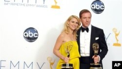 Claire Danes dan Damien Lewis, aktris dan aktor terbaik Emmy Awards untuk serial drama untuk peran mereka dalam "Homeland". (Foto: AP)