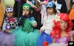 Participants parade during an annual Halloween event in Kawasaki, near Tokyo, Oct. 24, 2015.