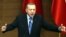 FILE - Turkish President Recep Tayyip Erdogan delivers a speech at the presidential complex in Ankara, Turkey, March 14, 2018.