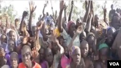 Displaced Nigerians gather at Minawao refugee camp in Cameroon, Feb. 10, 2021. (Moki Edwin Kindzeka/VOA)