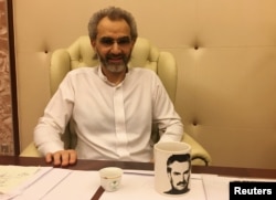 Saudi Arabian billionaire Prince Alwaleed bin Talal sits for an interview with Reuters in the office of the suite where he has been detained at the Ritz-Carlton in Riyadh, Saudi Arabia, Jan. 27, 2018.