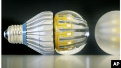 FILE - Switch75 light LED bulbs in clear and frosted, Nov. 8, 2011. California on Wednesday became the first state to set energy efficiency standards for household LEDs and smaller track-lighting-style light bulbs.