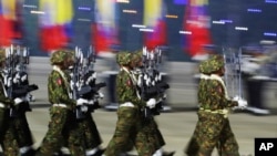 FILE - Myanmar subject   officers march during a parade to commemorate Myanmar's 79th Armed Forces Day, successful  Naypyitaw, Myanmar, March 27, 2024.