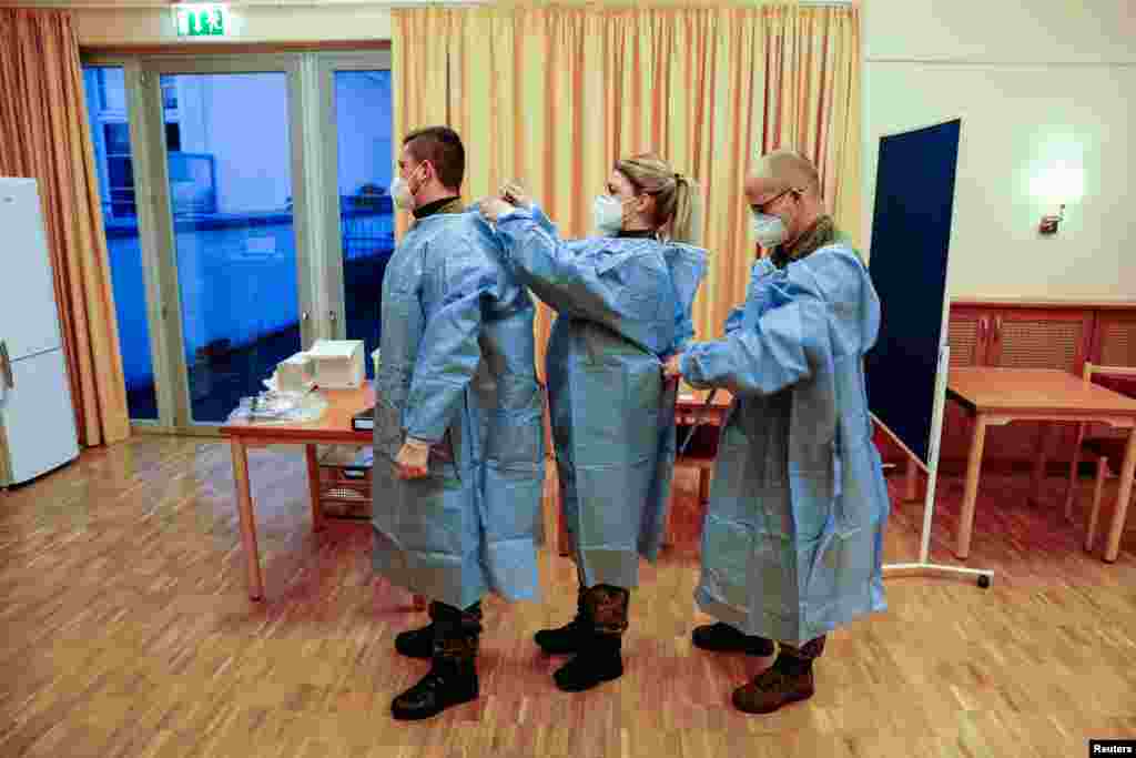 The German armed forces Bundeswehr vaccination team prepares for the Pfizer/BioNTech COVID-19 vaccinations at the Agaplesion Bethanien Sophienhaus nursing home in Berlin.