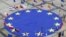 European Union flag lies at the centre of Schuman Square outside European Commission headquarters in Brussels, Belgium, May 8, 2021.  