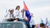 Supporters of Cambodia National Rescue Party campaign for the upcoming commune election to take place on June 4th, Phnom Penh, Cambodia, May 20, 2017. (Khan Sokummono/ VOA Khmer)