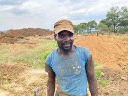 Felix Muchemwa, one of the panners in this gold-rich area of Mazowe, about 40 kilometers north of Harare, says gangs with machetes sometimes attack artisanal miners. (Columbus Mavhunga/VOA)