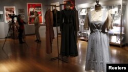 The "Dorothy" dress warn by Judy Garland in The Wizard of Oz is seen during a media preview of Bonhams and Turner Classic Movies Treasures from the Dream Factory at Bonhams in New York, Nov. 19, 2015. 