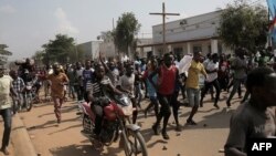 Several hundreds of people demonstrate, Dec. 27, 2018, in Beni, Democratic Republic of Congo, to protest the postponement, announced the day before by the Congolese national committee, of the general elections in this area because of the Ebola outbreak and militia action.