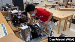 Jacob Torres worked on heating and cooling at Edison Academy, a career training high school in Fairfax County, Virginia.