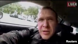 A still image taken from video circulated on social media, apparently taken by a gunman and posted online live as the attack unfolded, shows him driving in Christchurch, New Zealand, March 15, 2019. 