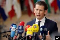 Austrian Chancellor Sebastian Kurz speaks with the media as he arrives for an EU summit in Brussels, March 22, 2018.