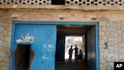 FILE - The entrance of Aden Central Prison, known as Mansoura, where one wing is run by Yemeni allies of the United Arab Emirates, is shown in this May 9, 2017, photo in Aden, Yemen. 