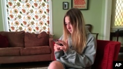 In this November 2018 photo, Laurel Foster participates in a Stanford University research study on using smartphones to help detect depression.