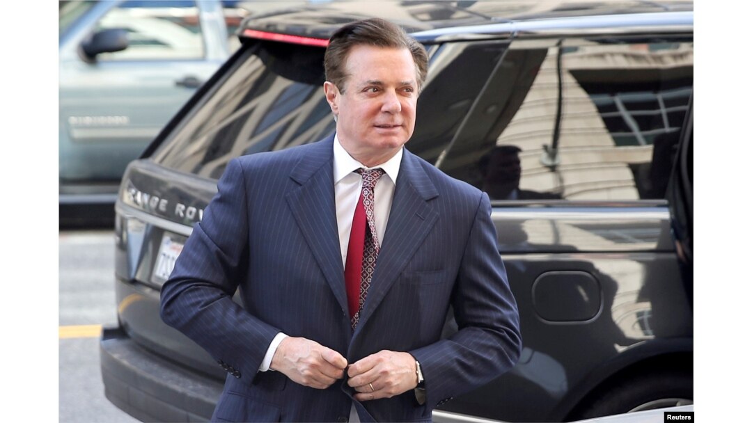 FILE - Former Trump campaign manager Paul Manafort arrives for arraignment on charges of witness tampering, at U.S. District Court in Washington, June 15, 2018.