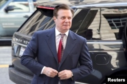 FILE - Former Trump campaign manager Paul Manafort arrives for an arraignment at U.S. District Court in Washington, June 15, 2018. Manafort masterminded the 2010 political comeback in Ukraine of now deposed pro-Russian president Viktor Yanukovych.