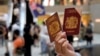 China Tidak Akan Lagi Akui Paspor Inggris Warga Hong Kong