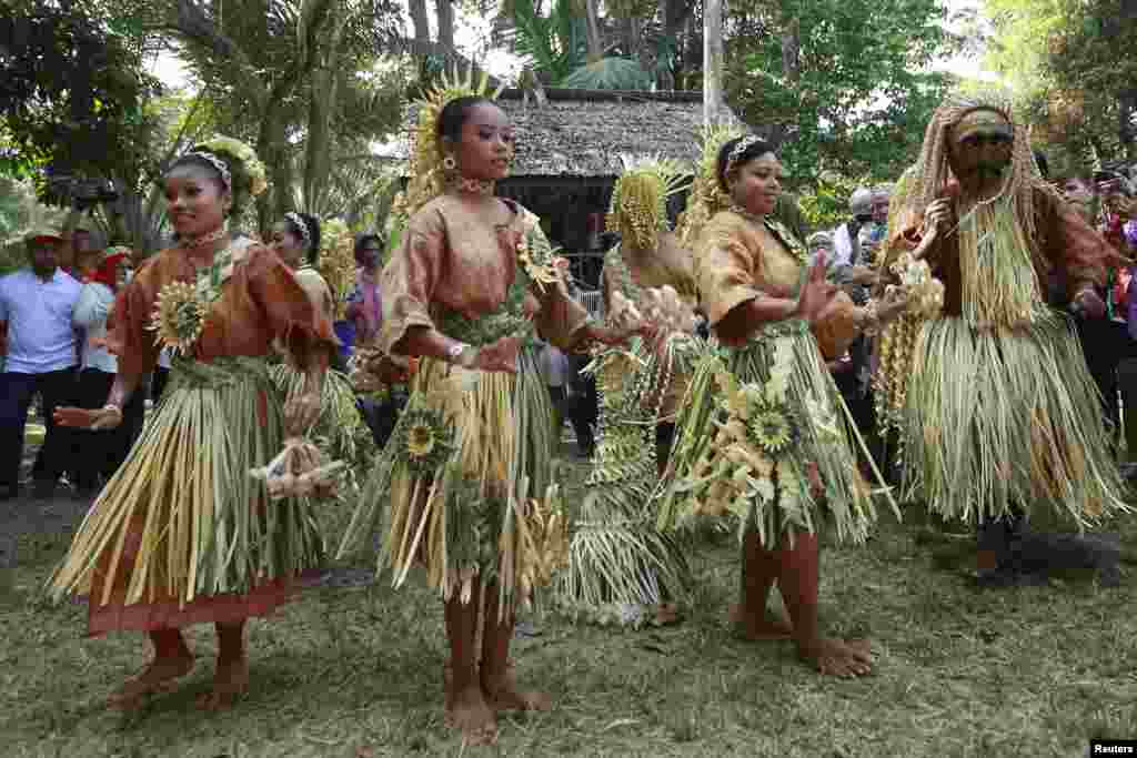 Mah Meri women wearing their traditional dresses perform the &quot;Main Jo-oh&quot; dance during the Ari Muyang festival in the Mah Meri village of Sungai Bumbun in Pulau Carey, some 140 km (87 miles) southwest of Kuala Lumpur, Malaysia.