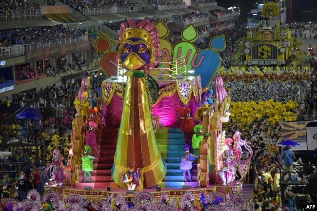 Members of the Sao Clemente samba school perform during the second night of Rio's Carnival parade at the Sambadrome in Rio de Janeiro, Brazil, March 4, 2019.