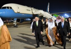 FILE - Secretary of State Mike Pompeo walks after stepping off his plane upon arrival at King Abdulaziz International Airport in Jeddah, Saudi Arabia, Sept. 18, 2019.