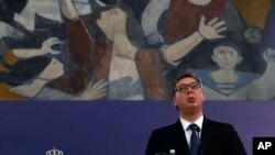 In this photo taken on June 18, 2020, Serbia's President Aleksandar Vucic speaks during a press conference in Belgrade, Serbia.