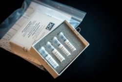 FILE - This undated file photo provided by U.S. Centers for Disease Control and Prevention shows CDC's laboratory test kit for the new coronavirus.