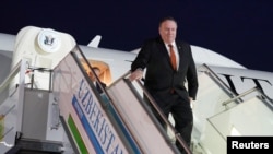 FILE - U.S. Secretary of State Mike Pompeo steps from a plane upon arrival in Tashkent, Uzbekistan, Feb. 2, 2020. 
