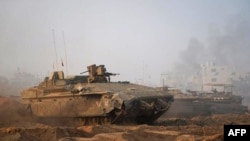 以色列陆军公布的照片显示以军在加沙北部展开行动。(2023年11月7日)