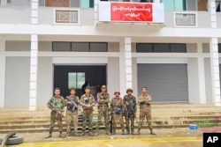 FILE - In this photograph  provided by Mandalay People's Defense, members of the Ta'ang National Liberation Army and Mandalay People's Defense absorption    forces airs  for a photograph   successful  beforehand   of a captured gathering  successful  Nawnghkio, Myanmar, connected  June 26, 2024.