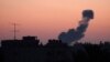 Smoke rises following an Israeli airstrike in the central Gaza Strip, June 20, 2018. 