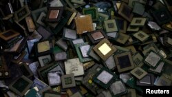 FILE - CPU chips are seen at a recycling facility in Tokyo in October 2010. 