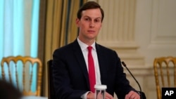 White House senior adviser Jared Kushner listens during a meeting with restaurant industry executives about the coronavirus response, in the State Dining Room of the White House, Monday, May 18, 2020, in Washington. (AP Photo/Evan Vucci)