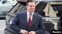 FILE - Former Trump campaign manager Paul Manafort arrives at U.S. District Court in Washington, June 15, 2018.